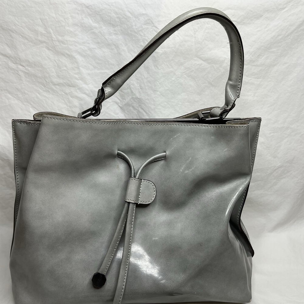 Alberta Di Canio Italian Leather Bag , In The Color Gray With Metal Accent .